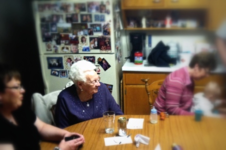 Grandam Marcella at the kitchen table